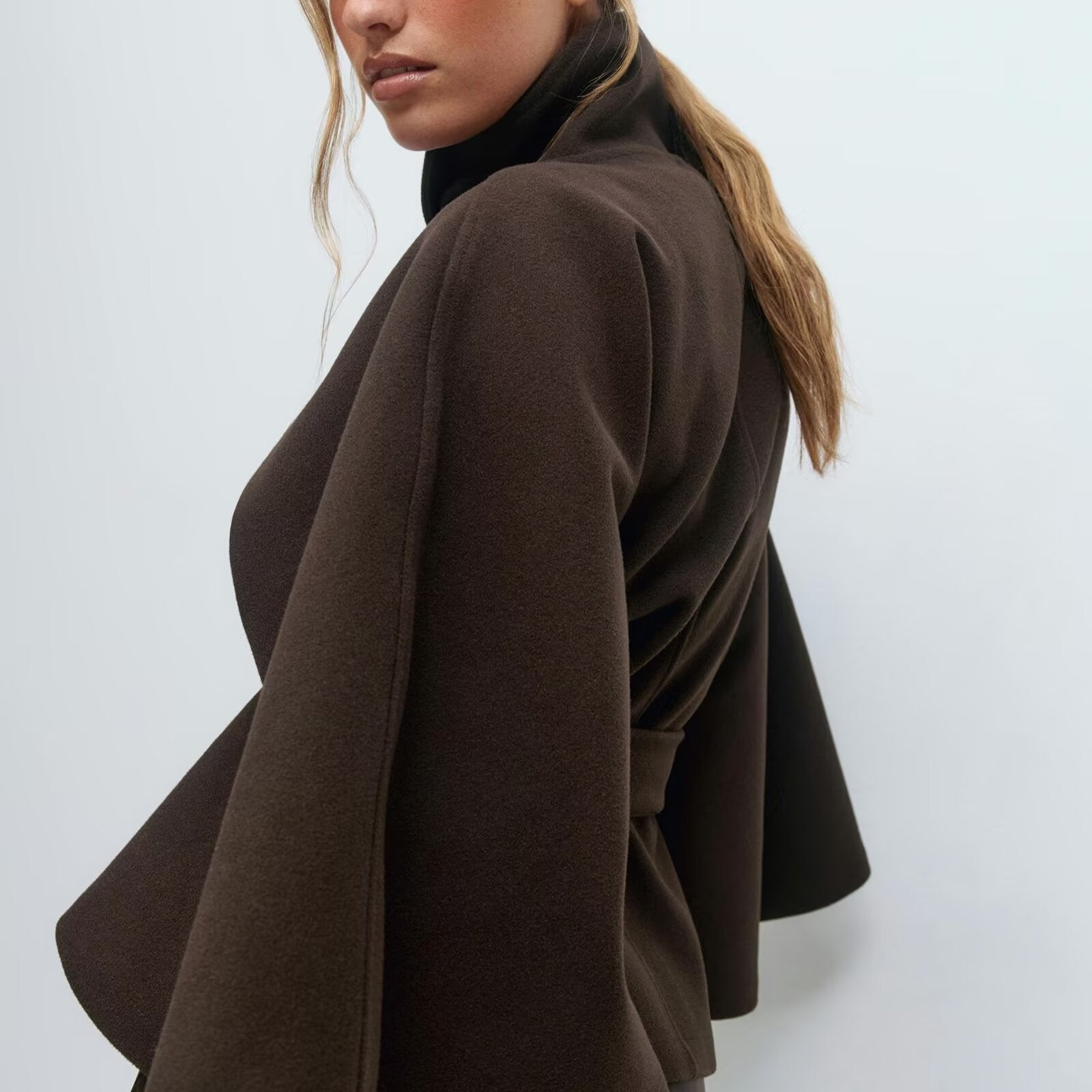 Graceful Langry fashion brown woolen cape coat with black turtleneck and layered skirt