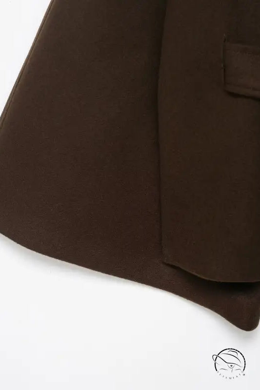 Brown woolen cape coat with pocket detail and flap closure