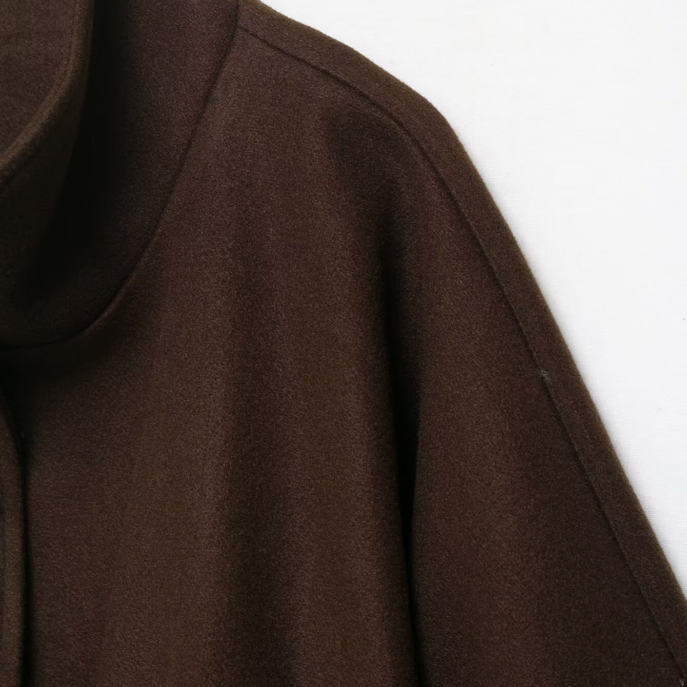 Graceful Langry fashion woolen cape coat with brown ribbed turtleneck