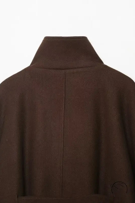 Brown woolen cape coat with high collar and button closure