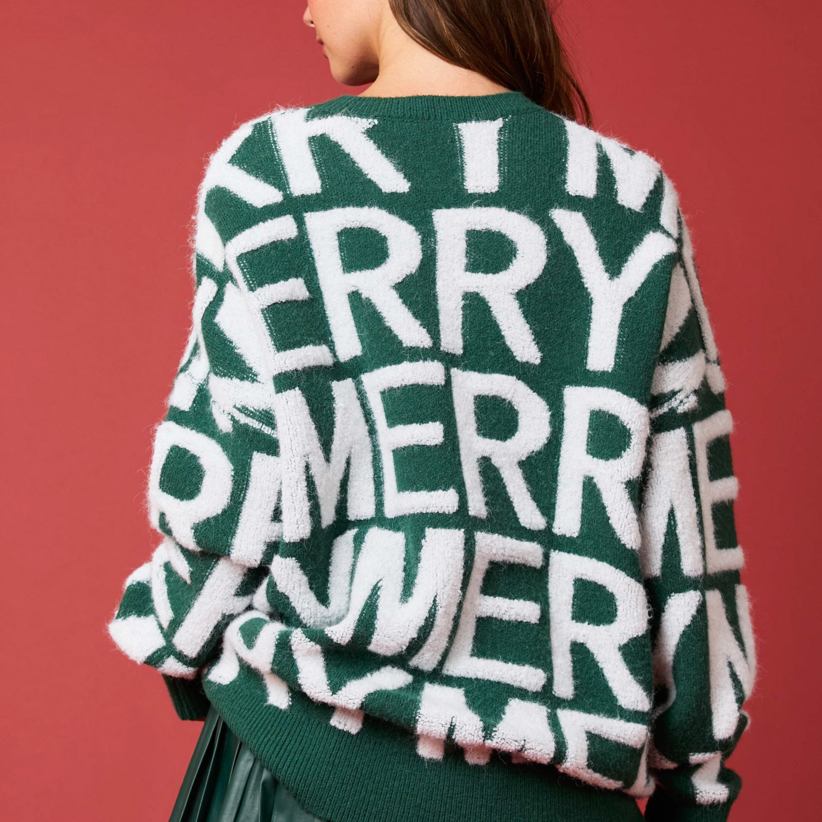 Green and white langry fashion sweater with merry text design