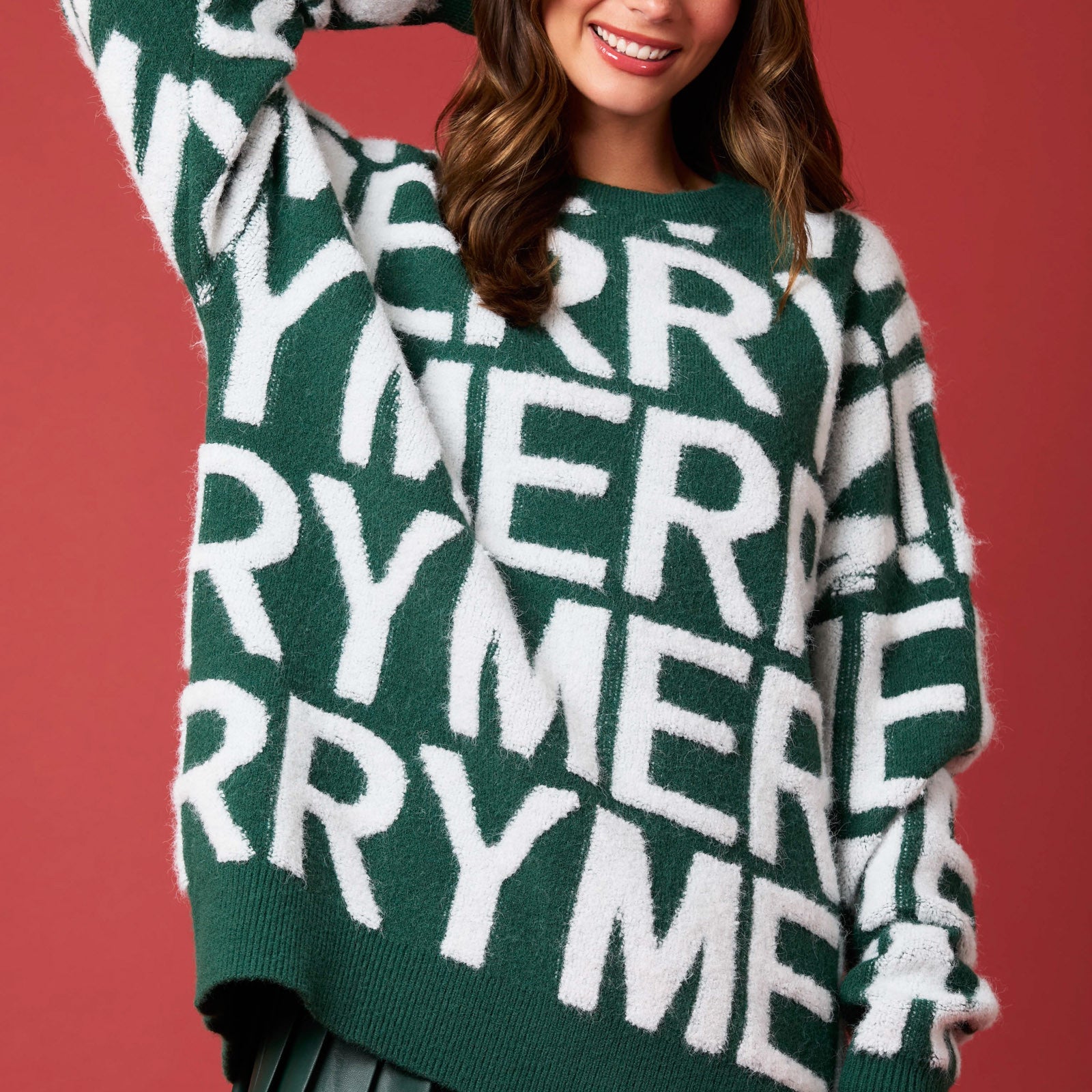 Langry fashion green oversized sweater with merry graphic and faux leather skirt