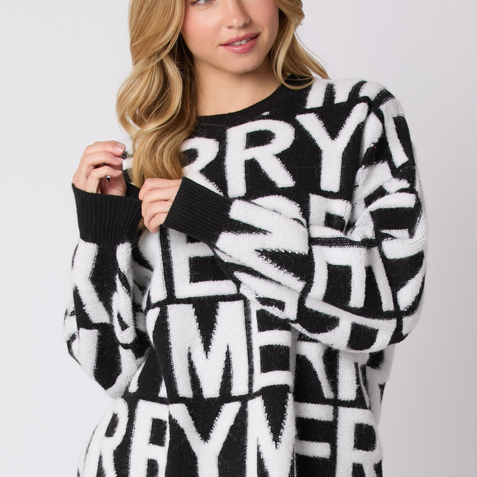 Black and white oversized langry fashion sweater with bold lettering