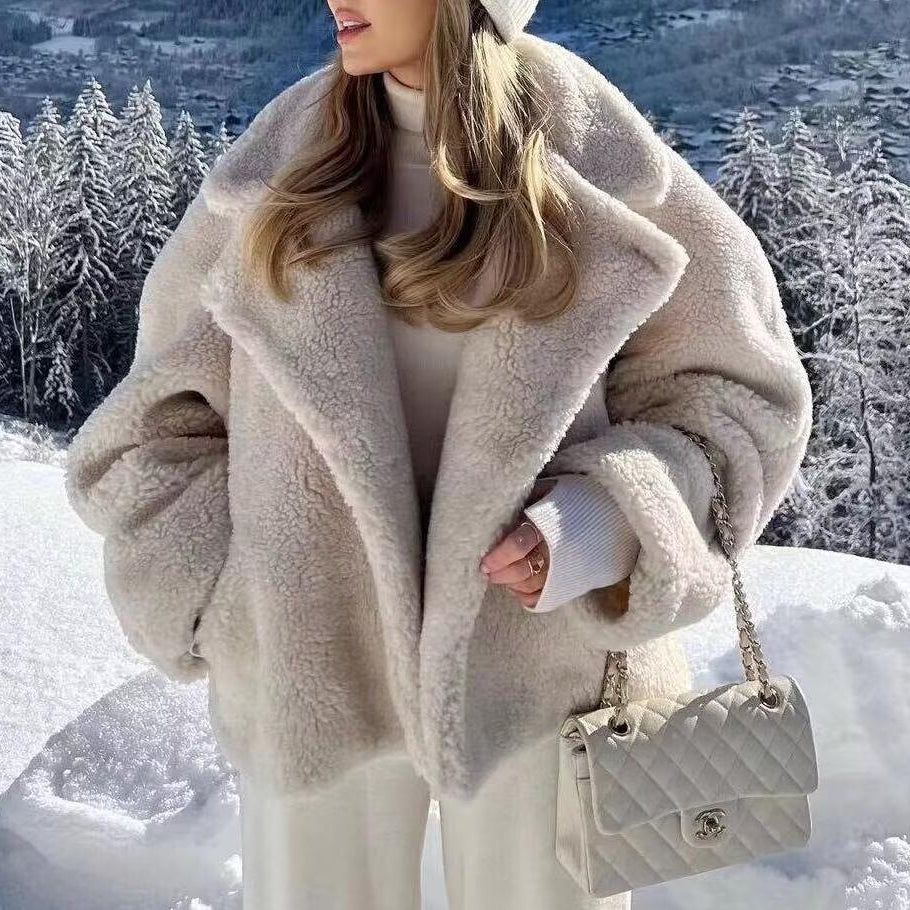 Elegant langry polo collar furry coat in beige quilted design with silver hardware