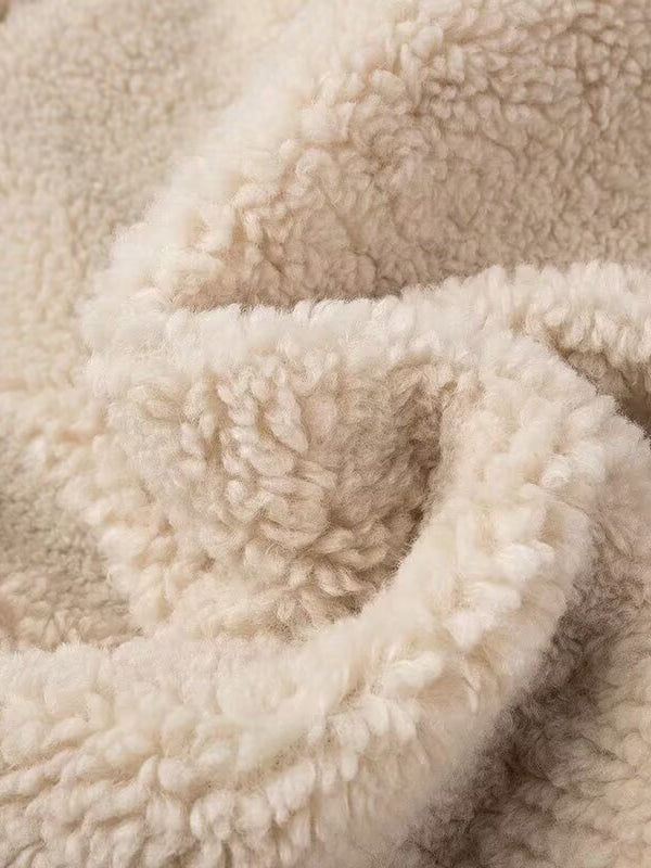 Cream-colored sherpa blanket in Langry fashion furry coat with polo collar