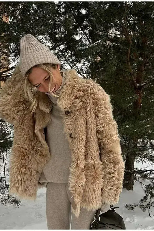 Casual big fur terry coat in beige faux fur with hood and buttons