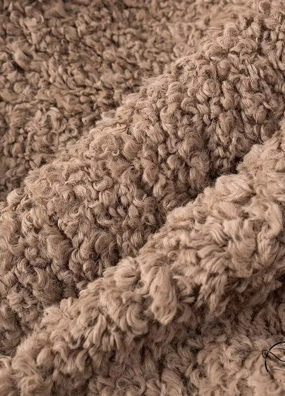 Casual big fur terry coat with beige textured throw blanket