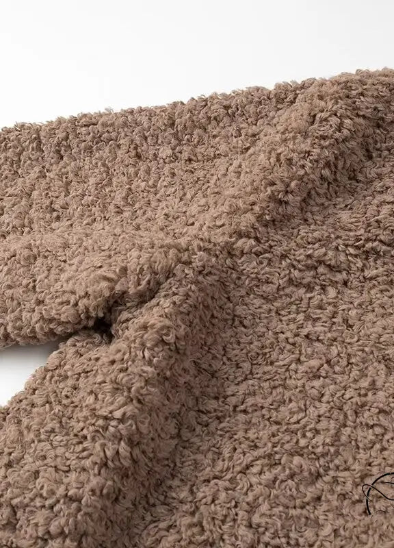 Casual big fur terry coat in taupe brown plush with textured surface and button closure