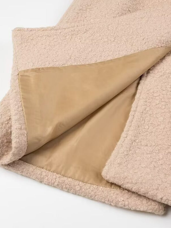 Beige sherpa blanket with satin backing in Langry double breasted overcoat