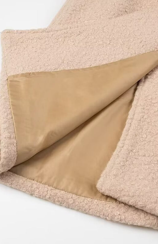 Beige sherpa blanket with satin backing in Langry double breasted overcoat