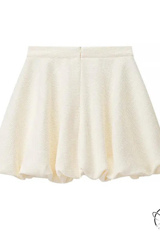 Enchanting short sleeve bud top with cream pleated skirt