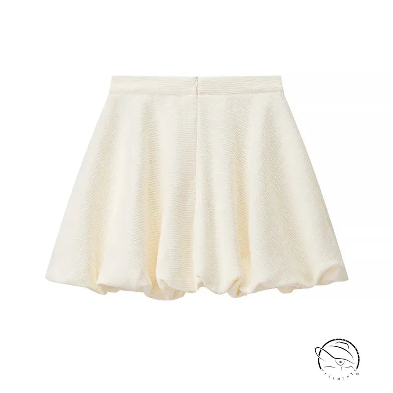 Enchanting short sleeve bud top with cream pleated skirt