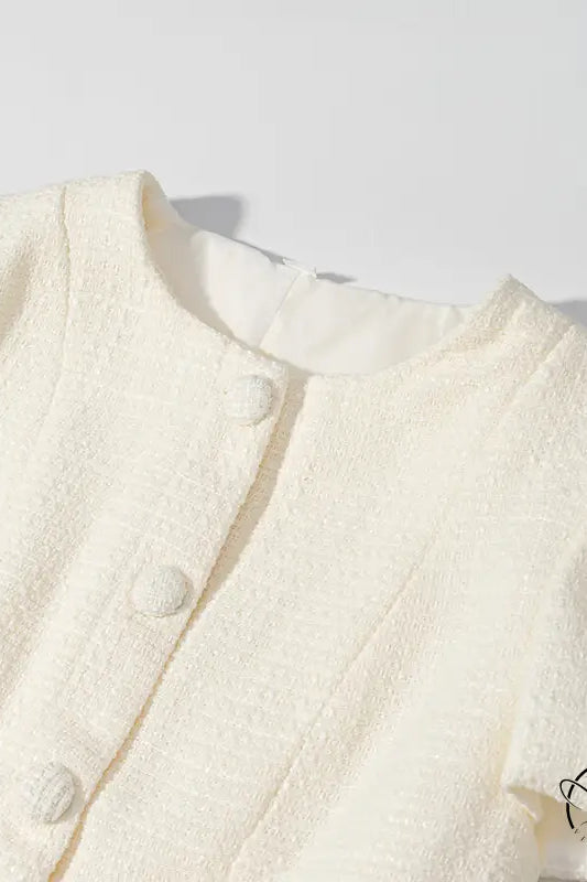 Enchanting short sleeve bud cream cardigan with round buttons and high neckline