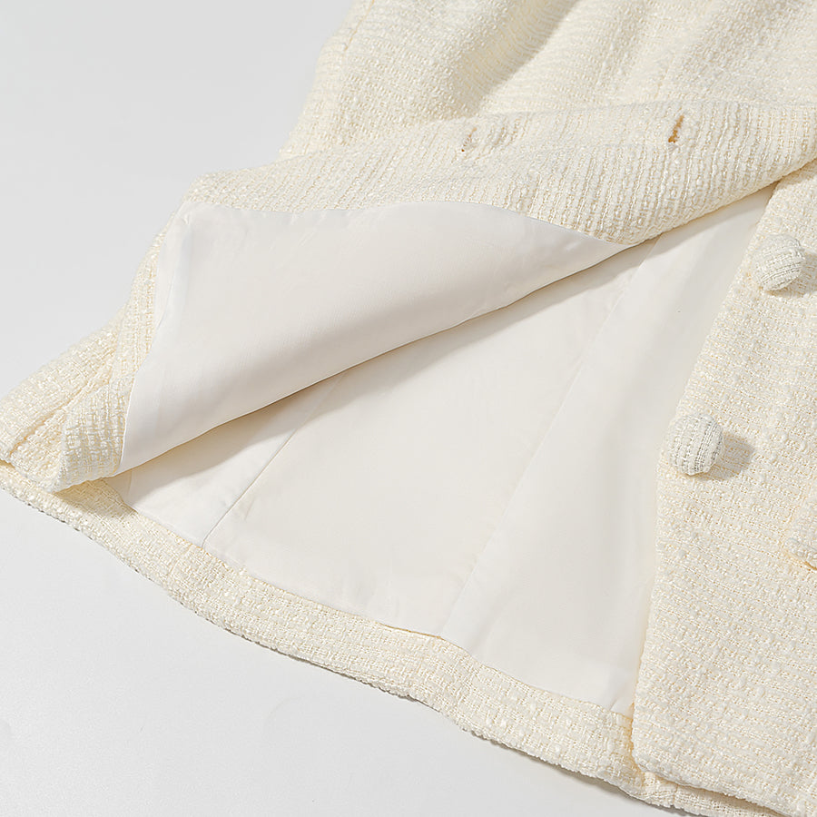 Cream short sleeve bud top with enchanting towel border pom-poms