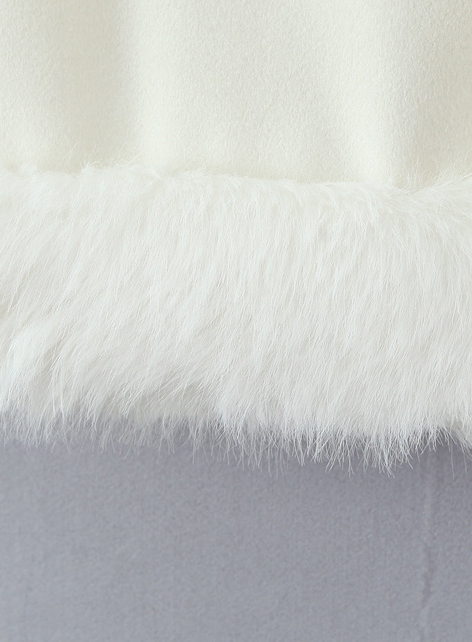 Elegant white fluffy faux fur scarf on Langry fashion woolen jacket