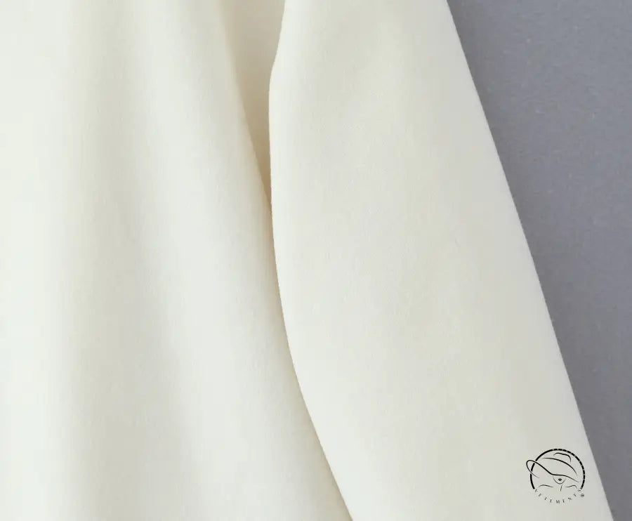Cream-colored soft fabric scarf with subtle sheen for Langry fashion woolen jacket