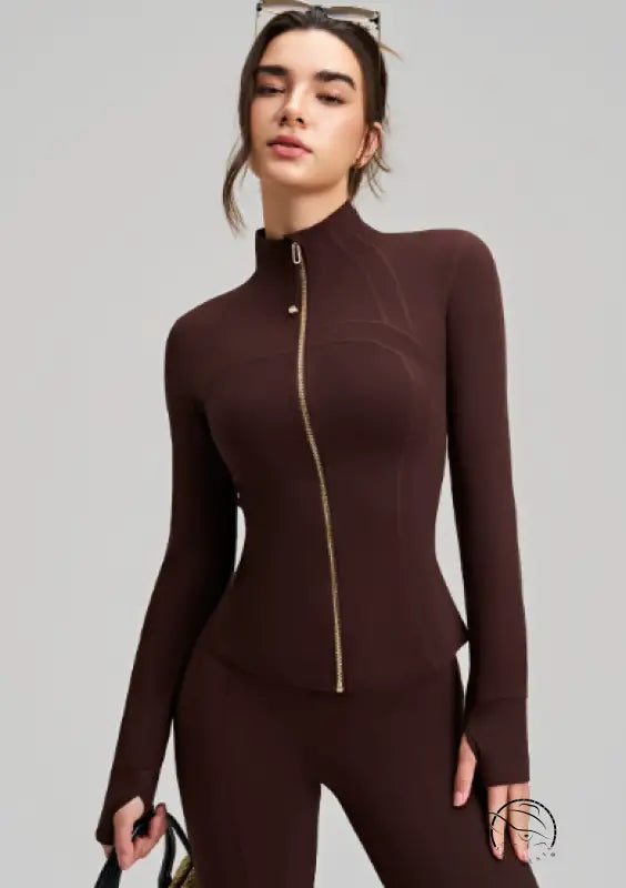 Brown long sleeve zip-up bodysuit with high neckline and finger stall