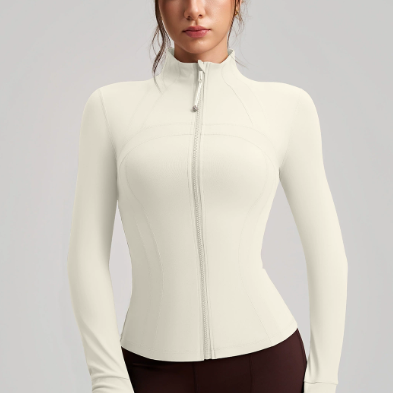 Long sleeve cream zip-up yoga jacket with ribbed cuffs and finger stall collar