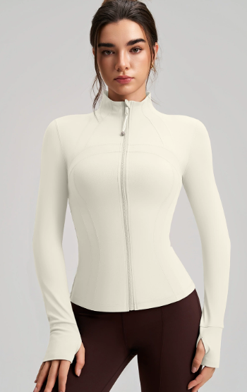 Long sleeve cream zip-up yoga jacket with ribbed cuffs and finger stall collar