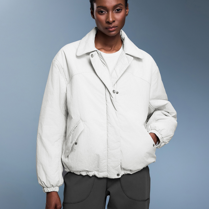 Langry fashion white puffer jacket with high collar and button closure