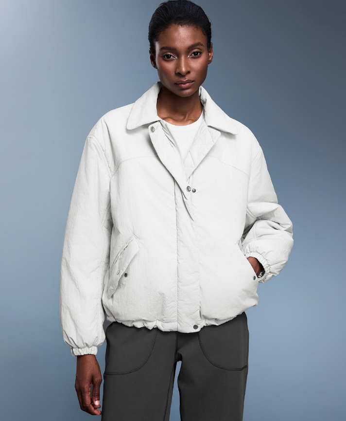 Langry fashion white puffer jacket with high collar and button closure