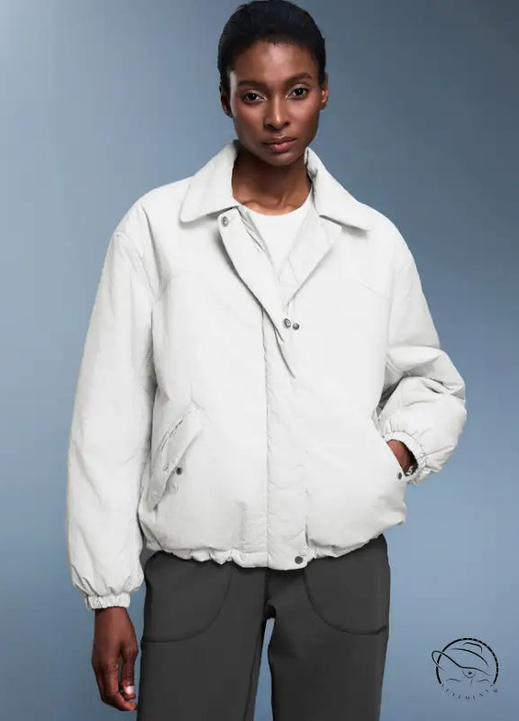 Langry fashion white puffer jacket with high collar and button closure