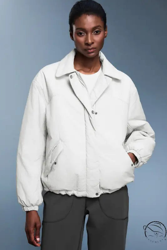 Langry fashion white puffer jacket with high collar and button closure