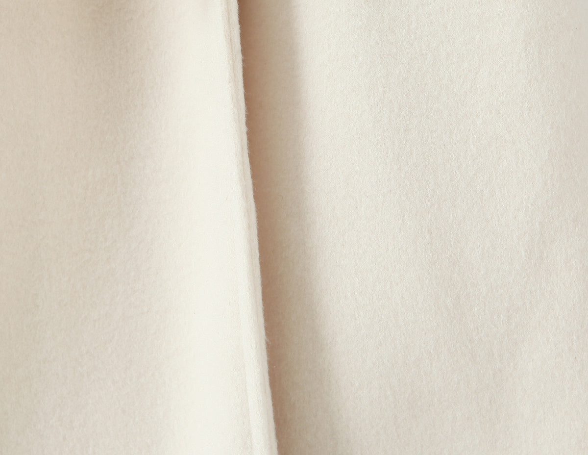 Elegant langry fashion white woolen coat with cream-colored cotton fabric