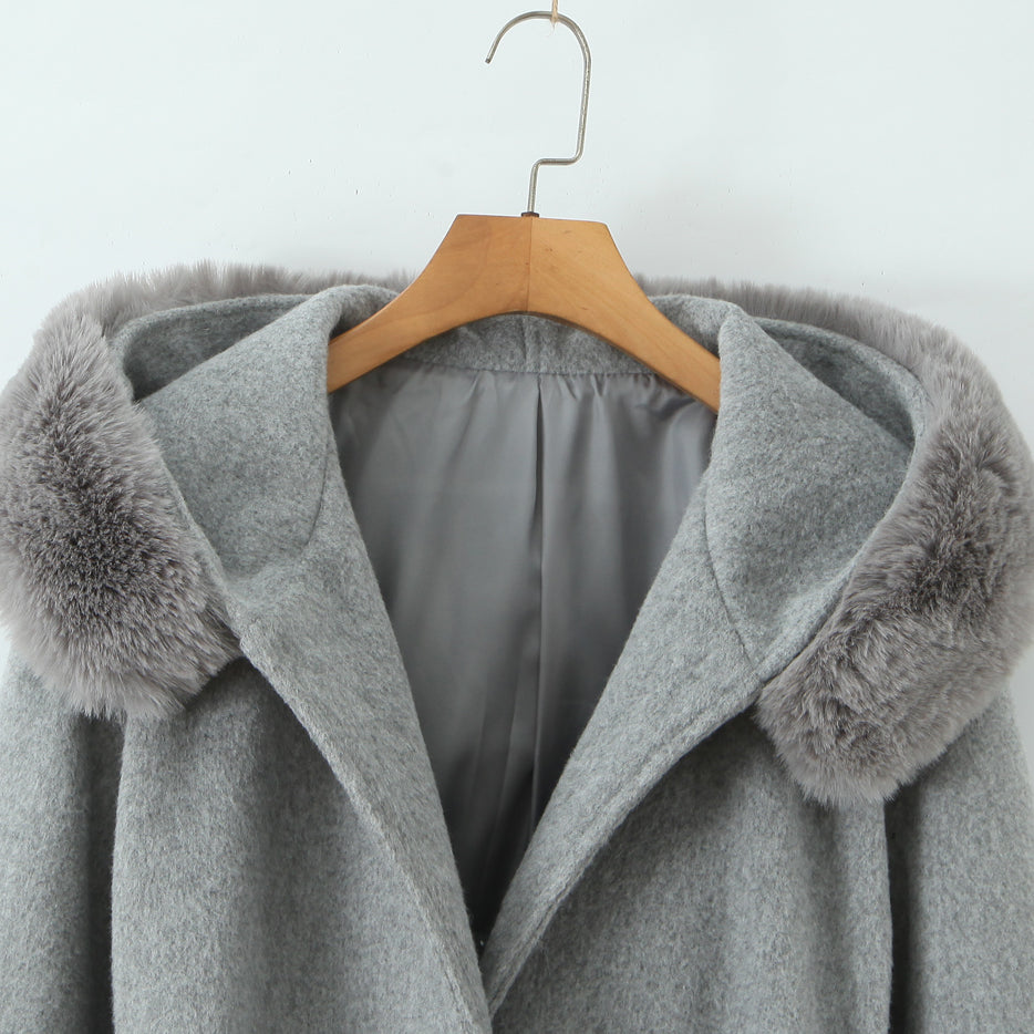 Langry fashion winter mid-length woolen hooded overcoat in gray with fur trim on wooden hanger