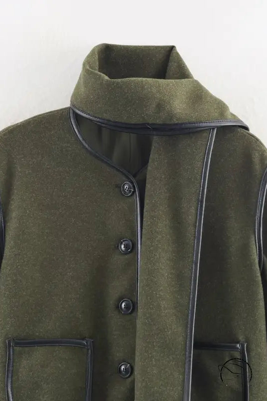 Langry olive green wool coat with black trim, military-inspired fashion