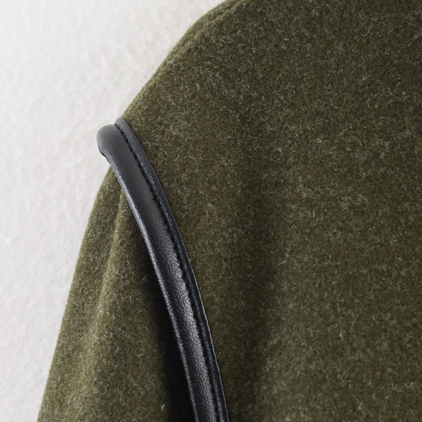 Langry fashion olive green textured woolen coat with black leather strap