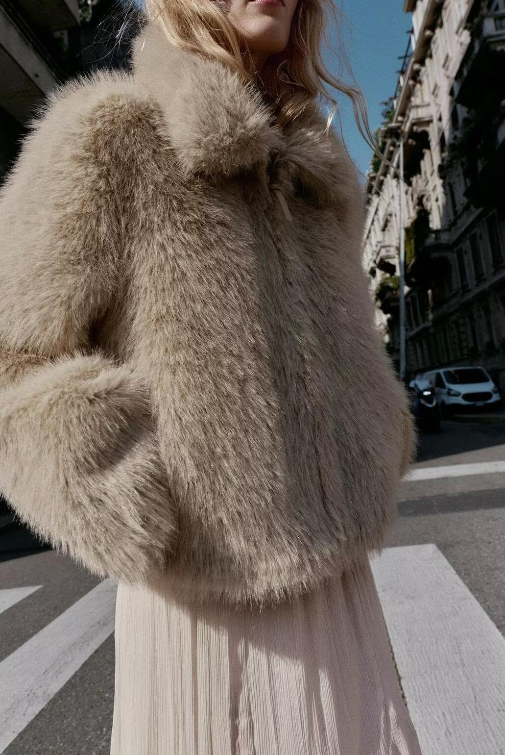 Fashionable beige faux fur langry coat with high collar