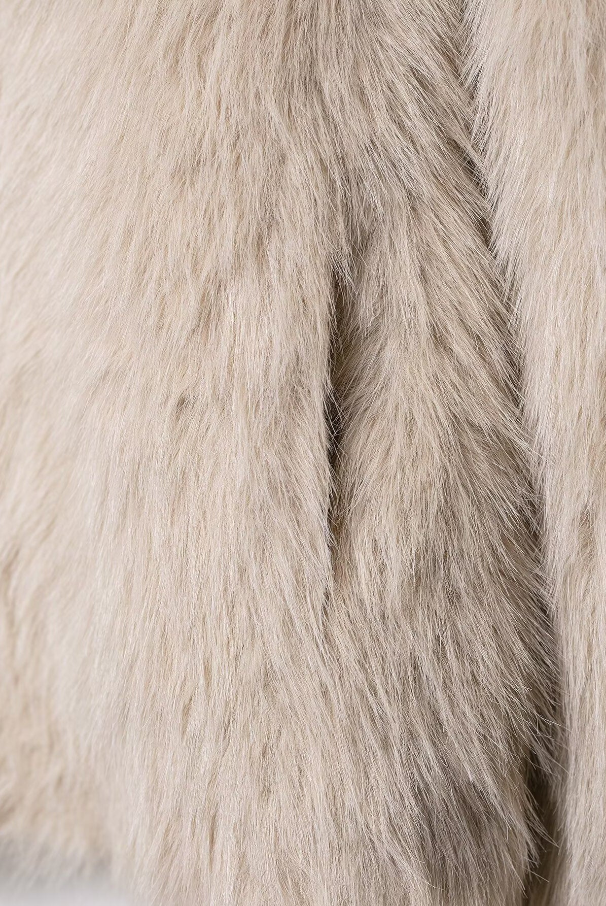 Luxurious beige faux fur Langry fashion coat with soft wool texture
