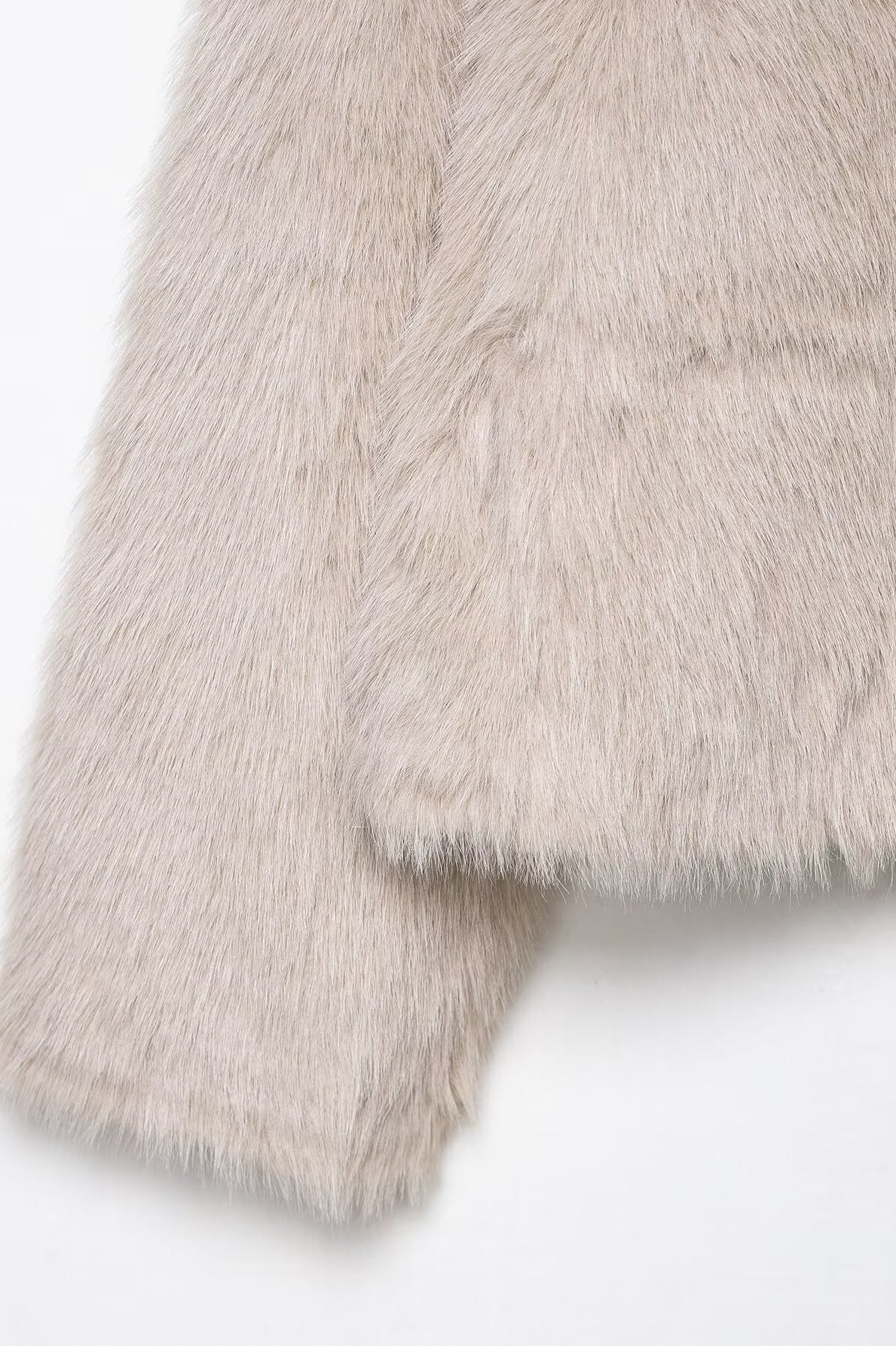 Fashionable beige faux fur langry jacket with plush texture