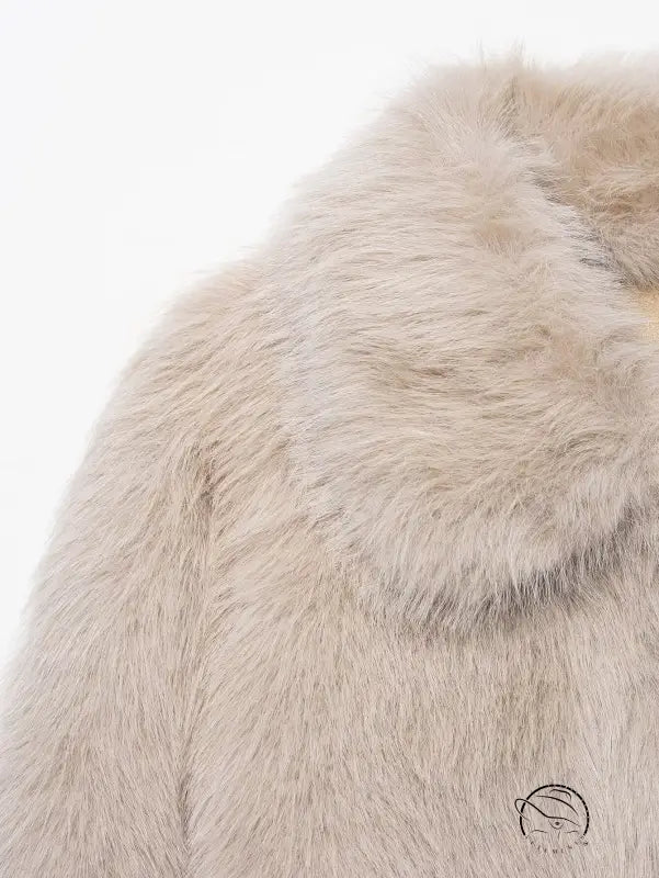 Cream faux fur scarf on fashionable warm Langry wool jacket