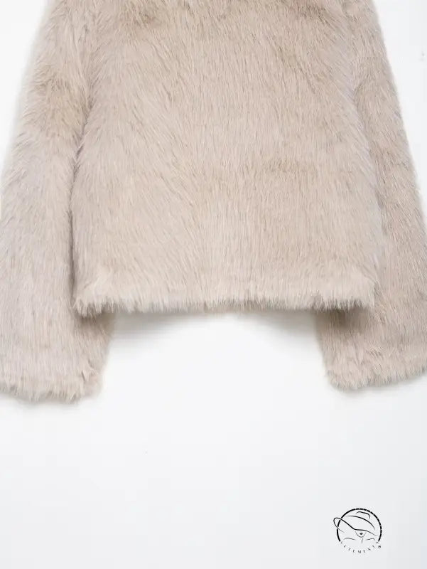 Fashionable beige wool jacket with fluffy faux fur texture