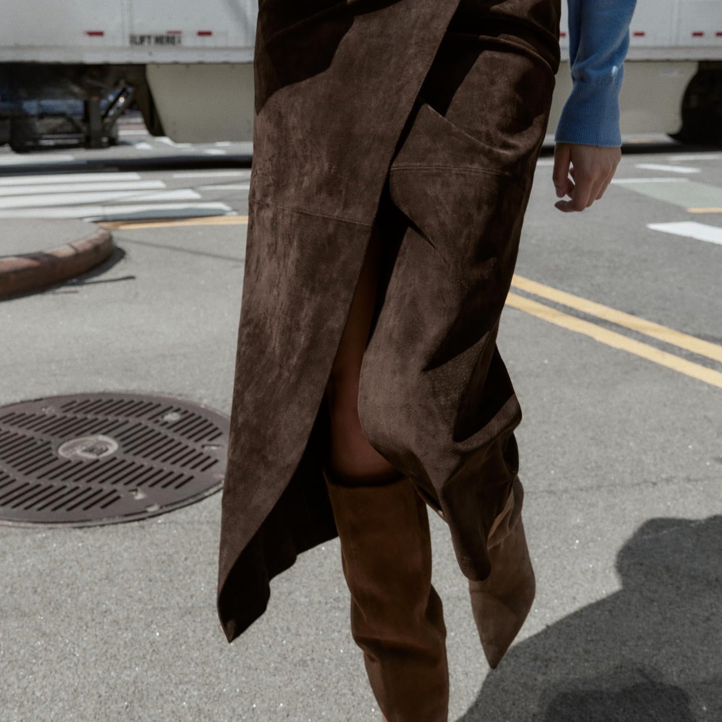 Brown suede sheath long skirt with front slit, asymmetrical hem, pockets, tan boots, Langry fashion ملابس