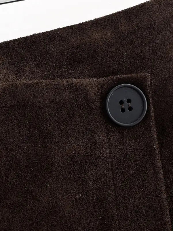 Brown suede fashion jacket with black buttons on langry sheath skirt