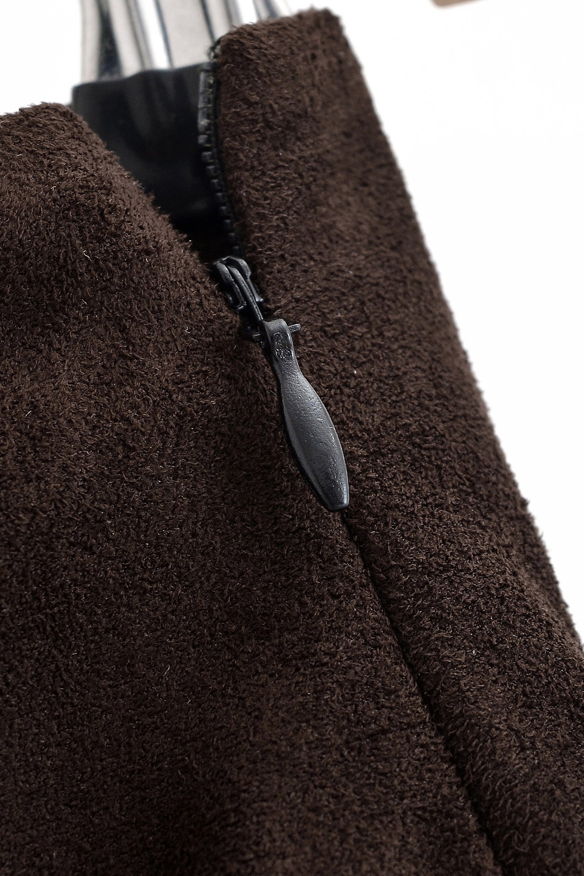 Brown suede langry fashion jacket with silver zipper on sheath skirt