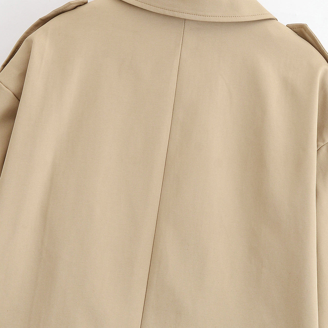 Enchanting Capable Short Khaki Trench Coat in beige with double-breasted closure and epaulettes from Langry fashion ملابس