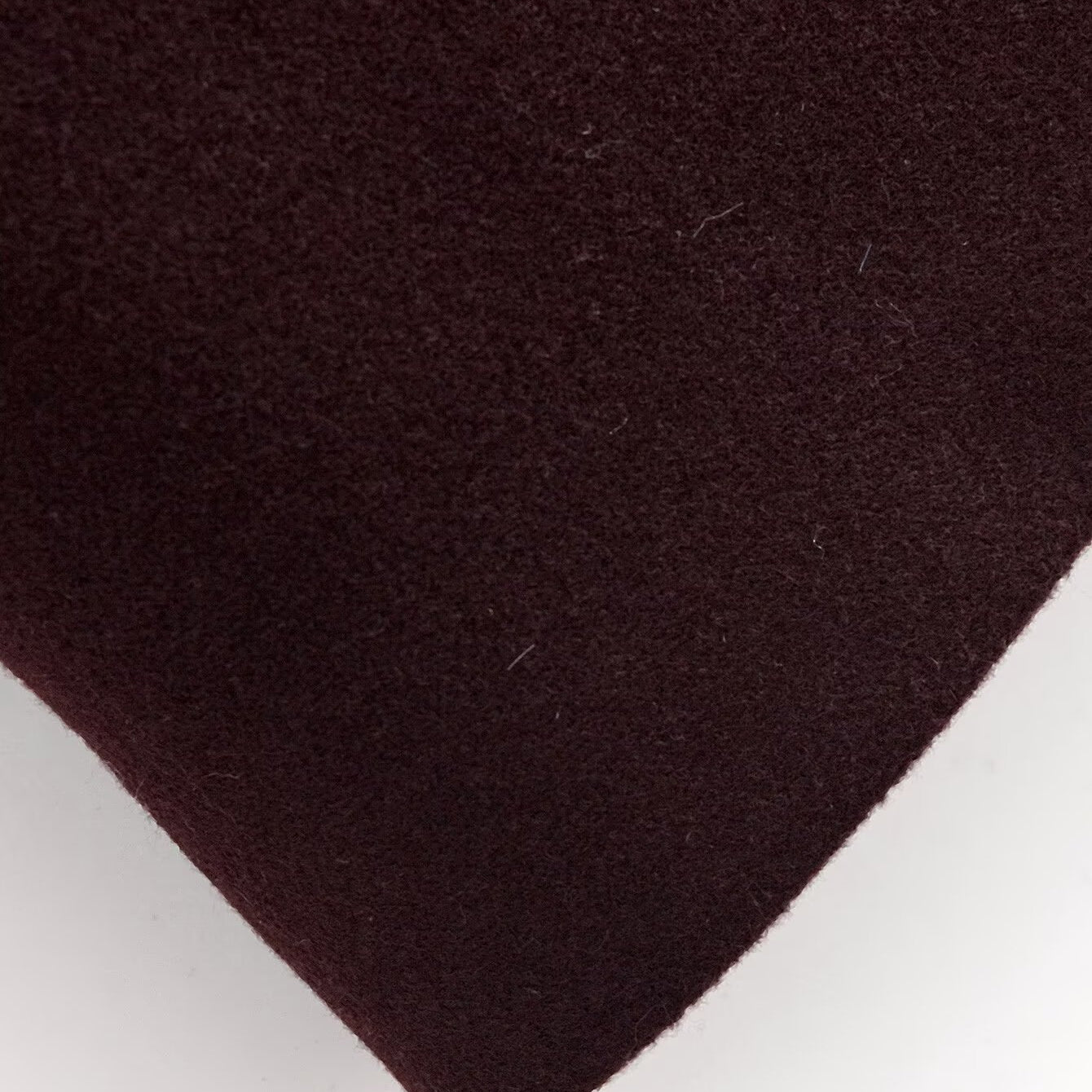 Brown felt coaster with smooth texture for Langry fashion overcoat