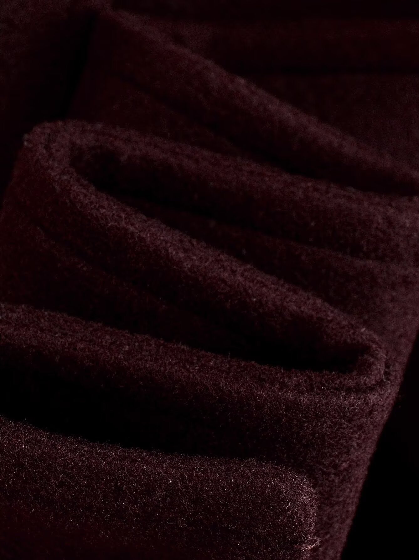 Dark red textured langry woolen overcoat with ribbed cuffs