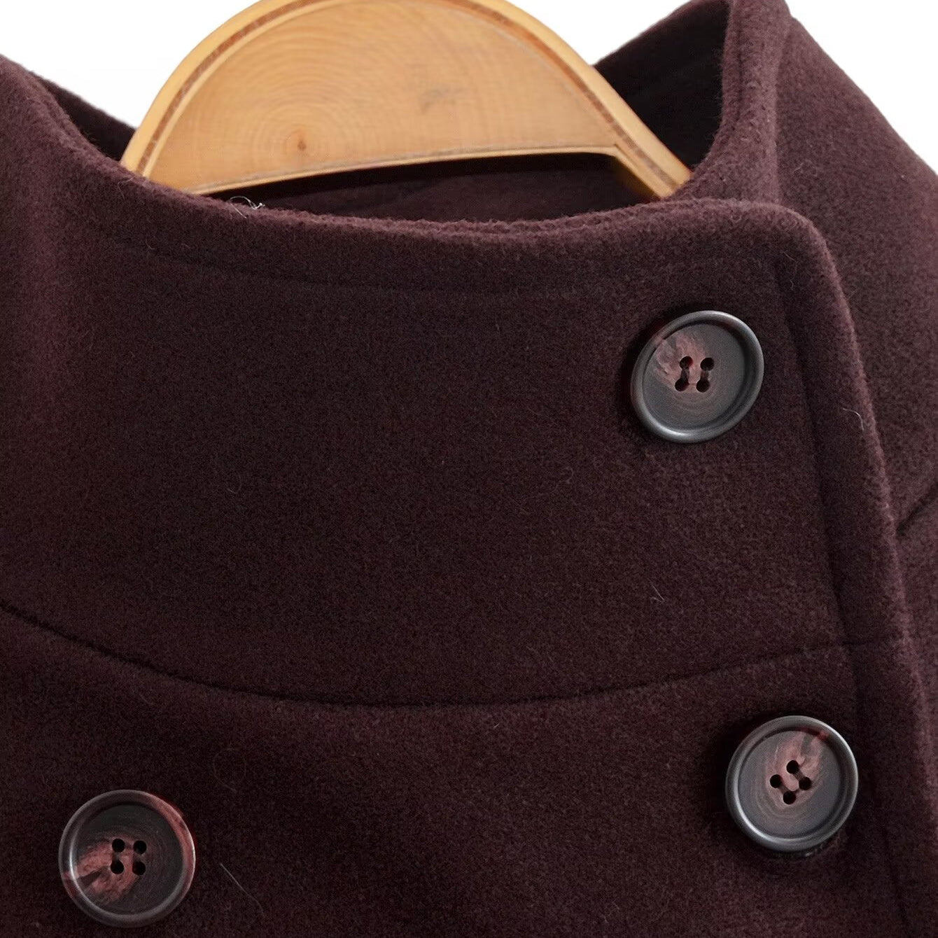 Brown double-breasted wool overcoat with silver buttons on wooden hanger, Langry fashion ملابس