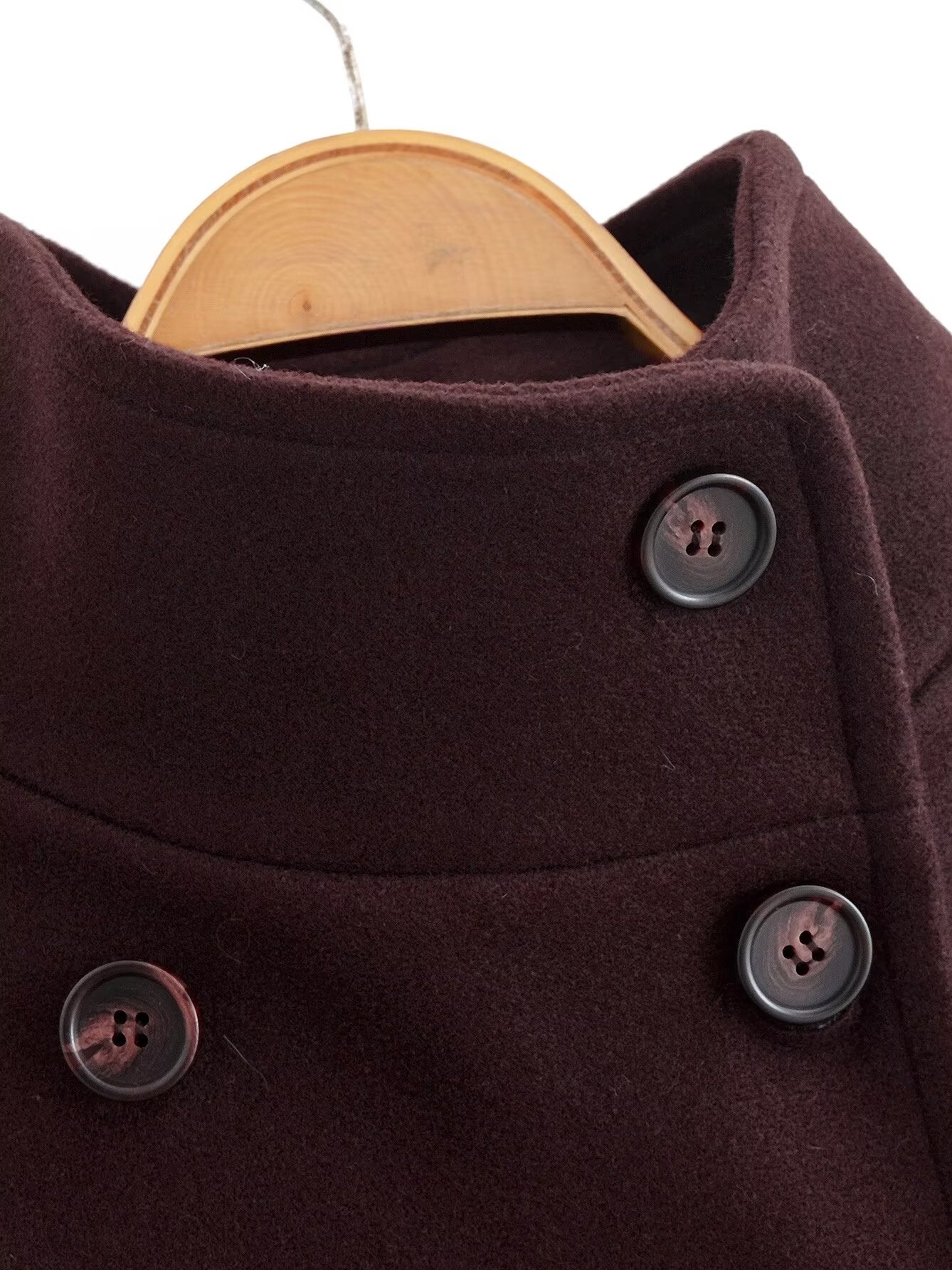 Brown double-breasted wool overcoat with silver buttons on wooden hanger, Langry fashion ملابس