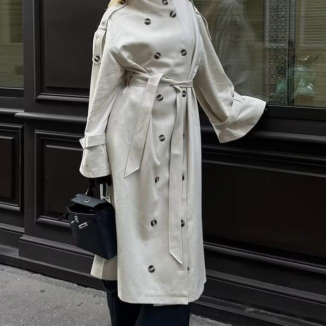 Langry fashion cream double-breasted trench coat with black buttons and belt