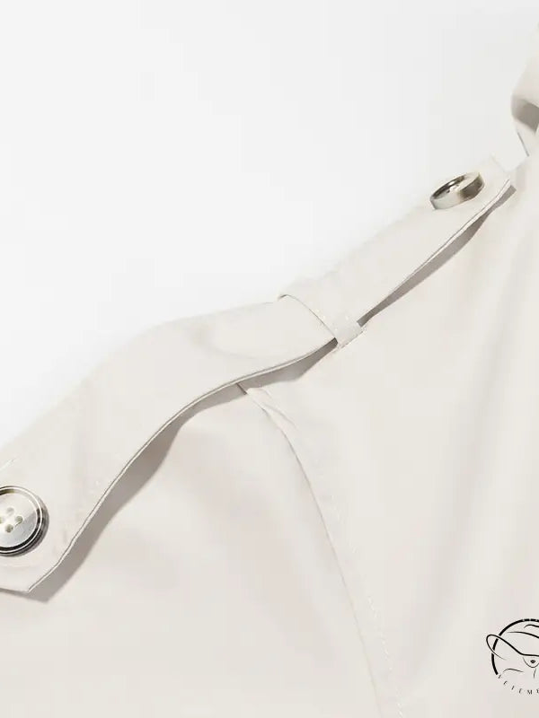 White button-up shirt with silver buttons in Langry windbreaker winter fashion