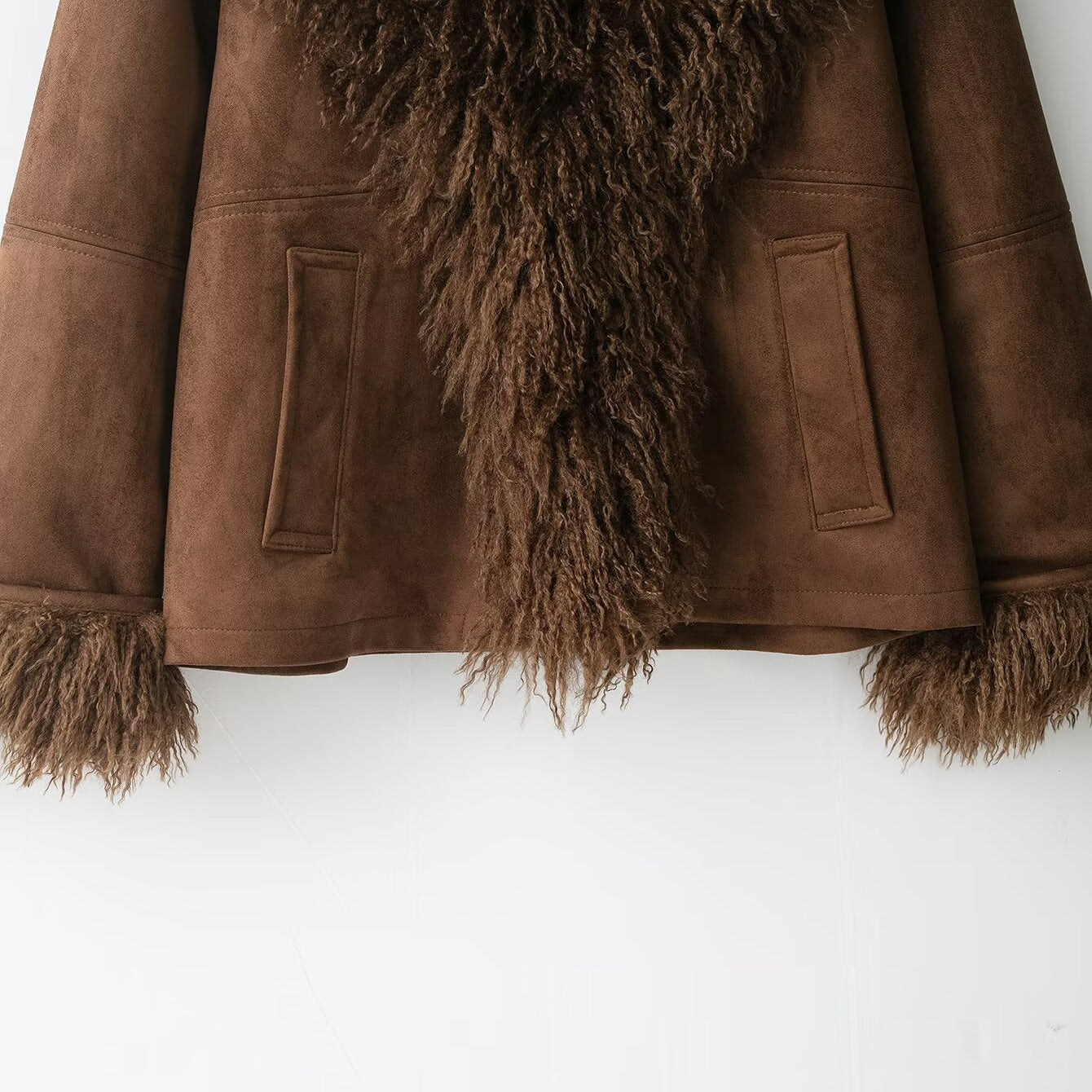 Elegant faux shearling autumn coat with fur lining and pockets
