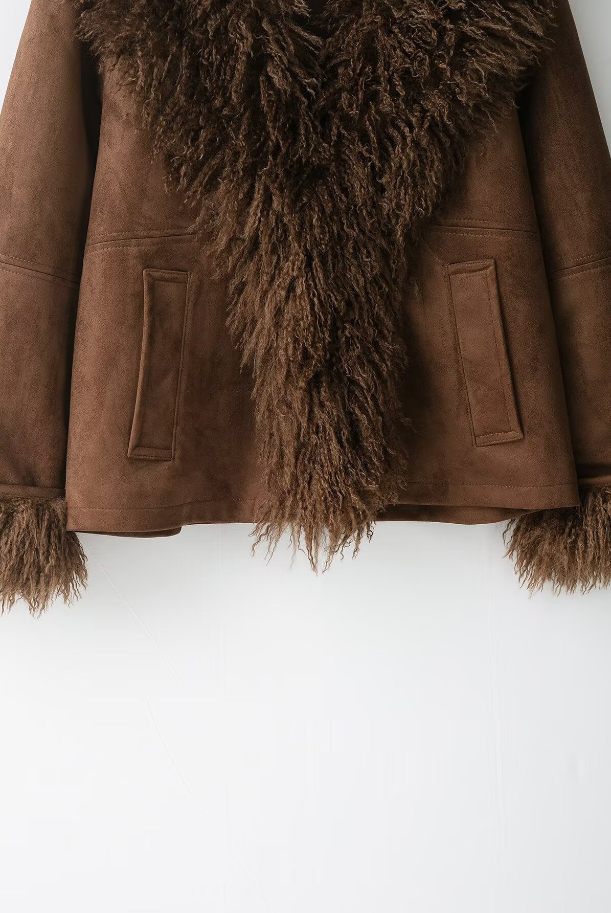 Elegant faux shearling autumn coat with fur lining and pockets