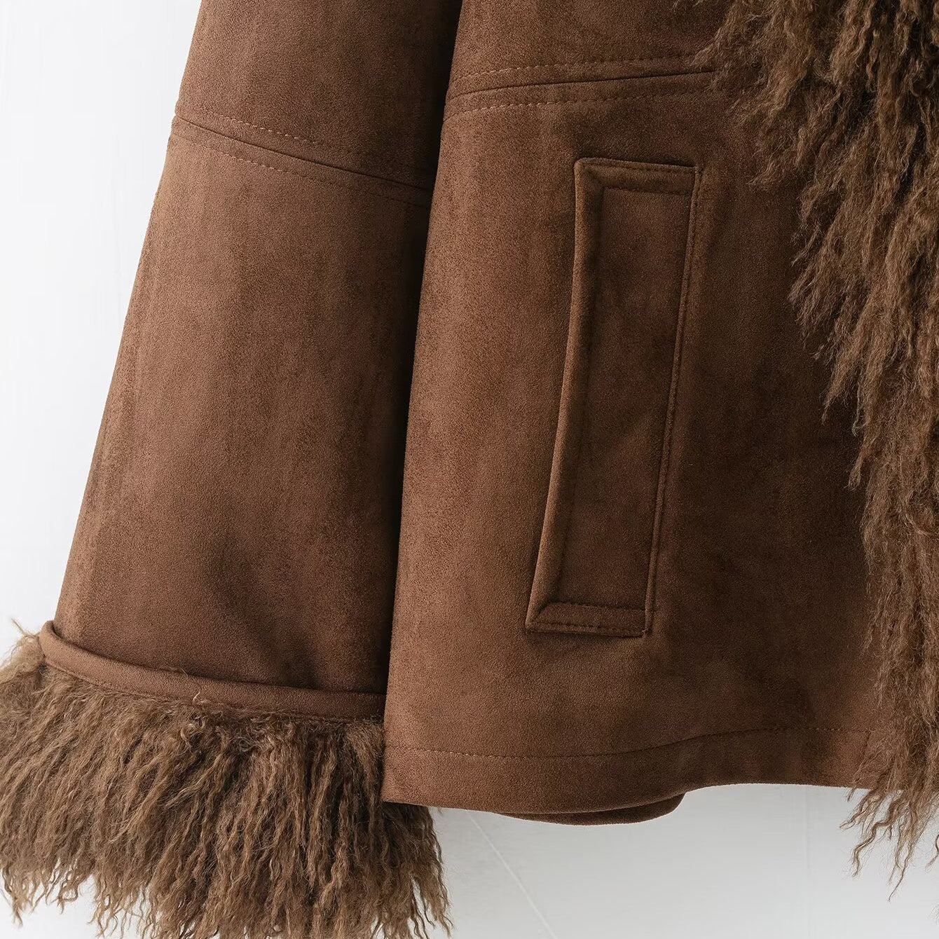 Elegant autumn faux shearling coat with fur trim and pocket detail