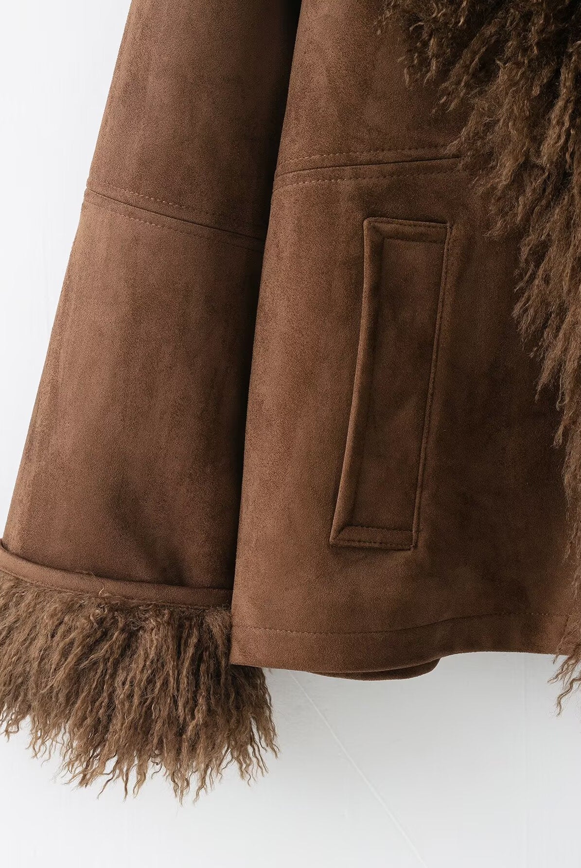 Elegant autumn faux shearling coat with fur trim and pocket detail